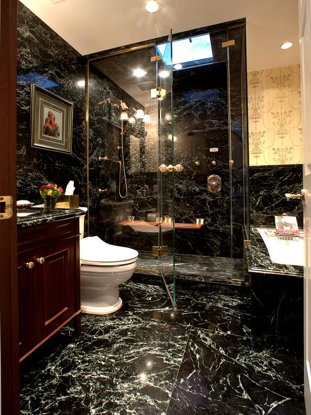 Elegant Marble Bathroom With Glass Enclosed Shower and Gold Fixtures | HGTV