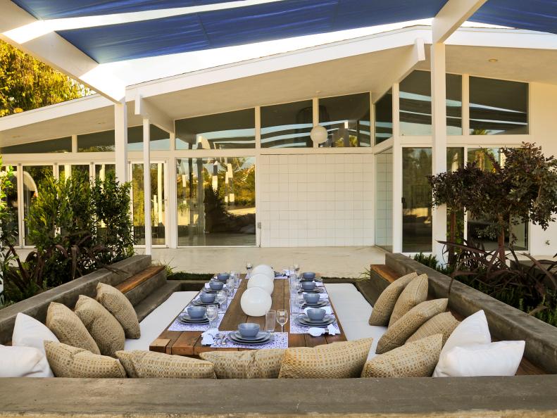 Modern Outdoor Lounge and Dining Room With Shade