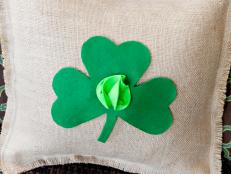Add an easy-to-make felt shamrock to a burlap pillow to decorate for St. Patrick's Day.