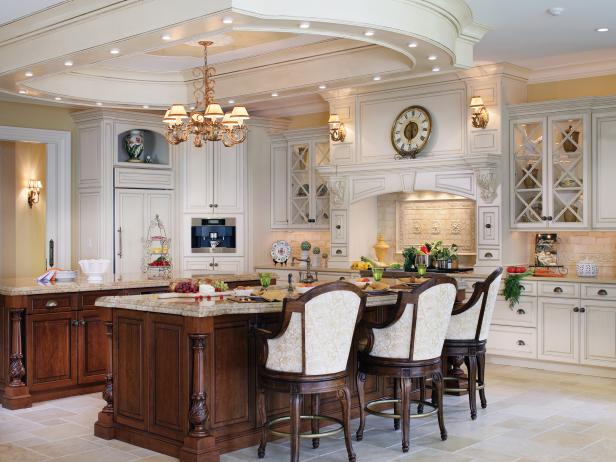 Traditional White Kitchen With Tray Ceiling and Chandelier