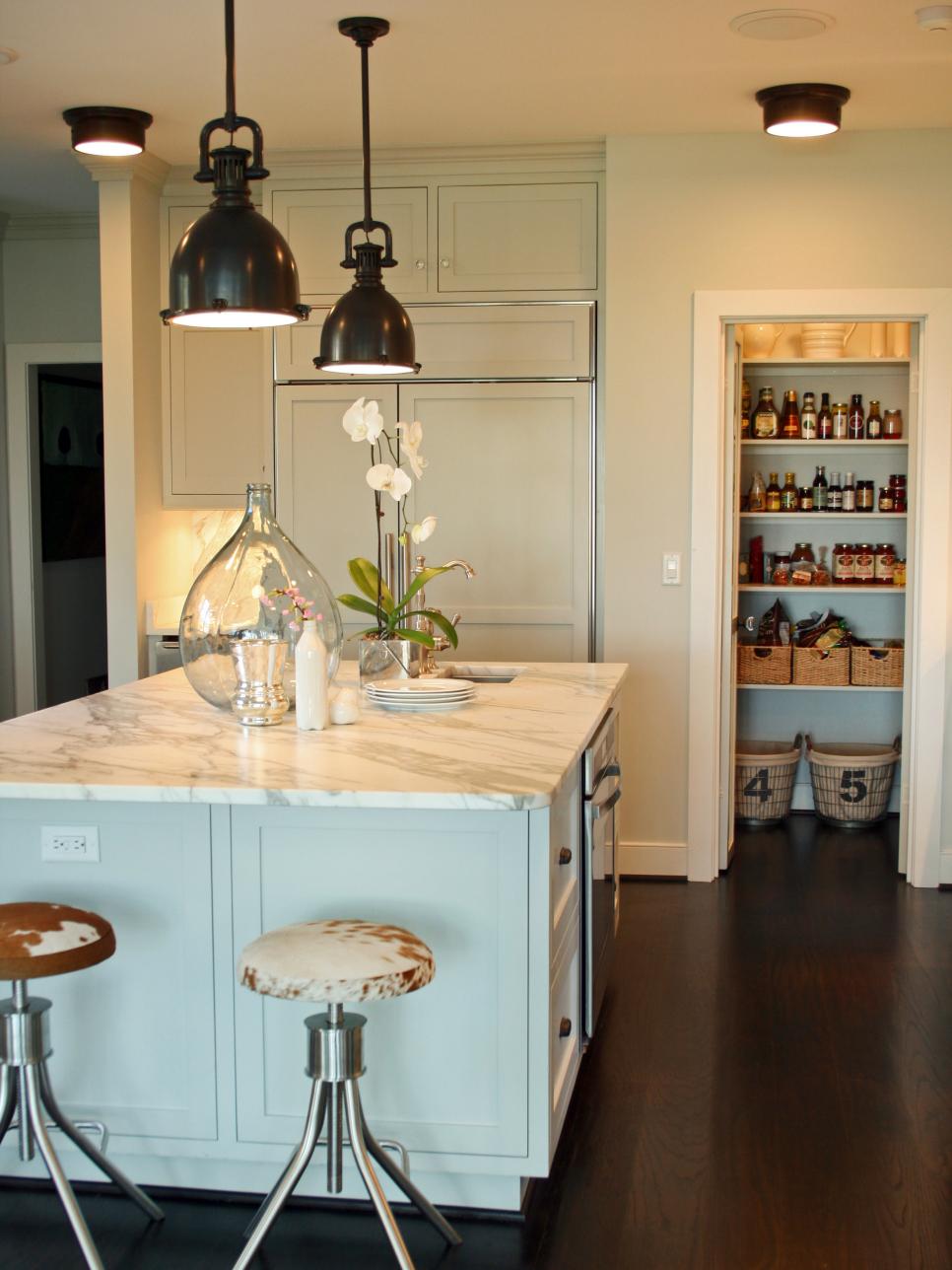 White Contemporary Kitchen Island With Industrial Pendants | HGTV