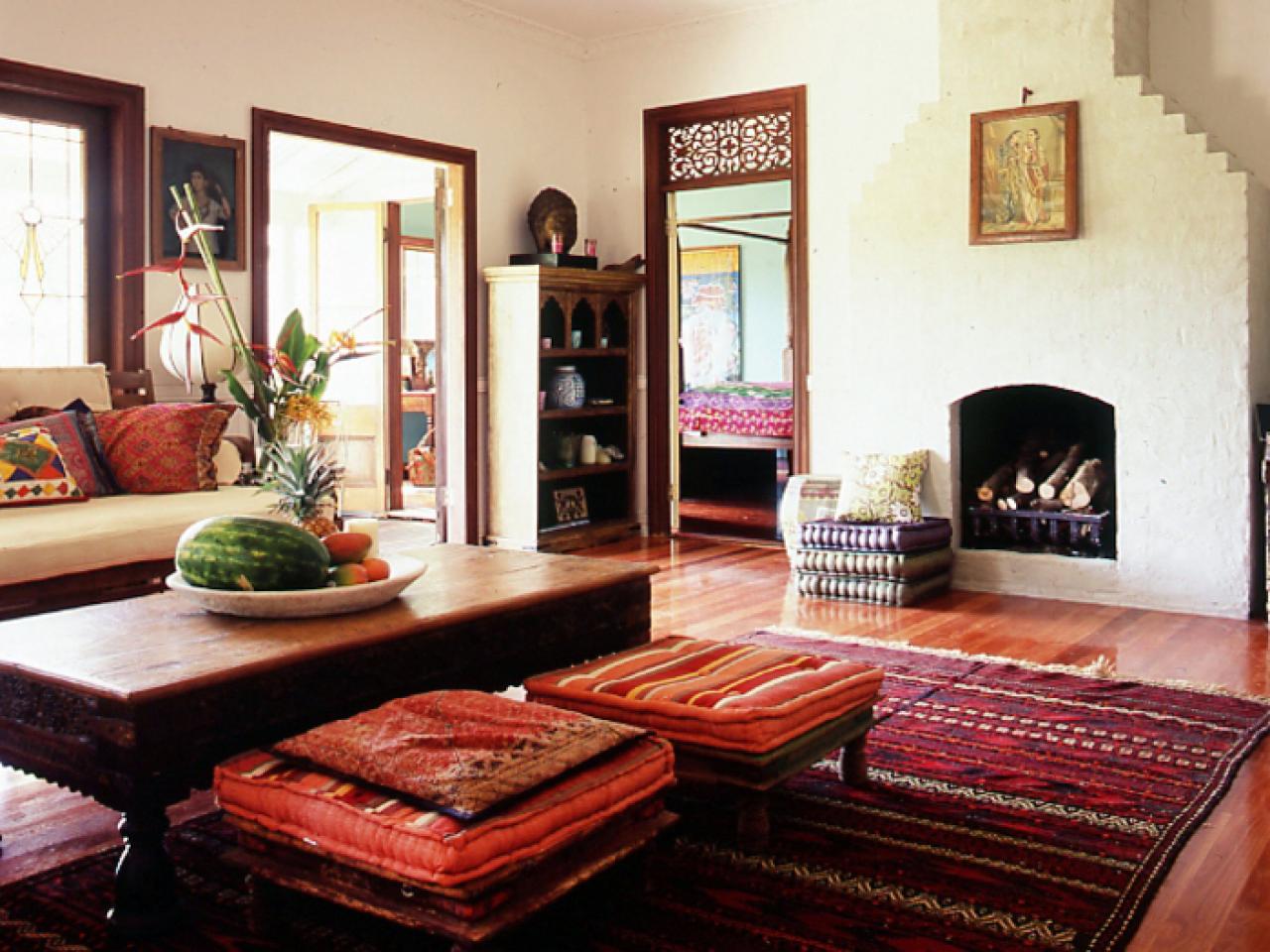 Indian-Style Living Room With Rich Red Rug | HGTV
