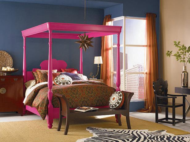 Bright Pink Canopy Bed in Navy Bedroom