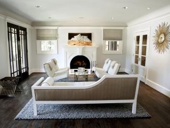White Living Room With Fireplace, White Chairs and Taupe & White Sofa