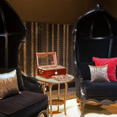 Black Balloon Chairs In Asian-Inspired Sitting Area
