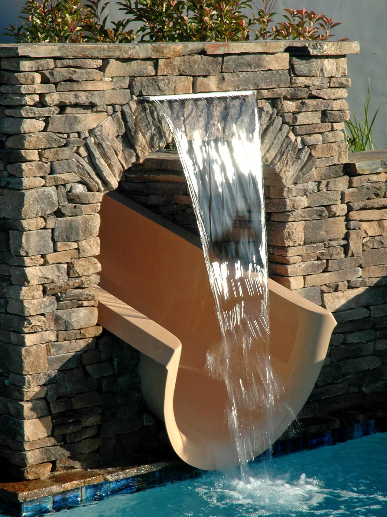 Swimming Pool Water Slide With Stacked Stone Surround and ...