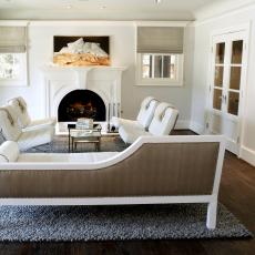White Contemporary Living Room With Chaise and Fireplace