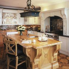 Ornate Traditional White Kitchen with Wood Carved Island