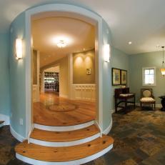 Elegant Transitional Entryway With Hardwood Flooring 