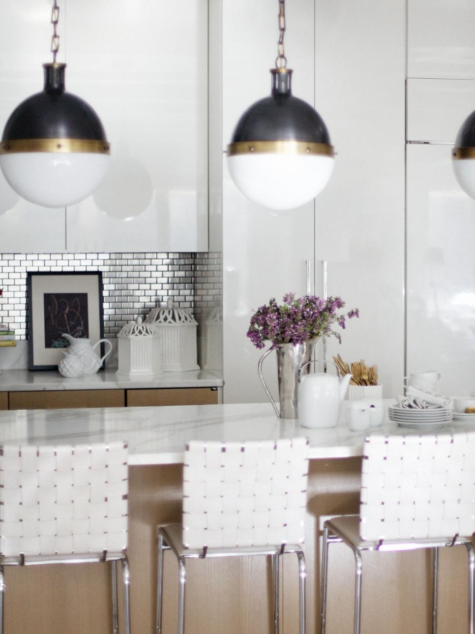 White Kitchen with Globe Pendant Lights and Metallic Accents | HGTV