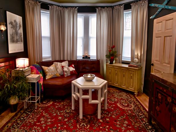 Three-Window Living Room with Red Leather Sofa and ...