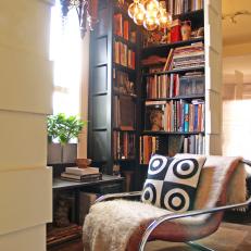 Reading Nook With Bookshelves, Vintage Armchair and Modern Bulb Light