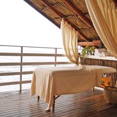 Covered Terrace With Massage Table and Ocean Views