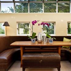Bright, Inviting Dining Room With Banquette Seating