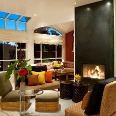 Contemporary Living Room With a Black Fireplace