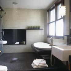 Asian-Inspired Spa Bathroom With Rain Shower and Freestanding Tub