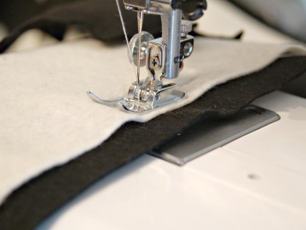 A sewing machine speeds up the process for making a DIY Halloween pillow.