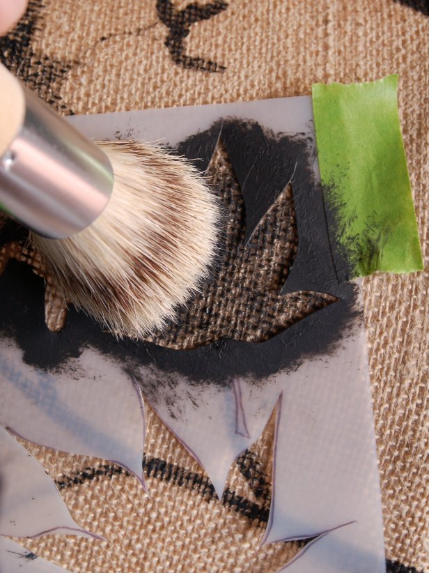 To ensure clean lines, paint away from stencil edges, blotting the brush on a paper towel prior to painting lampshade. For a more natural look, use different sizes and styles of leaves at end of branches. Tip: Rinse and dry stencil between uses to prevent paint from accidentally getting on lampshade