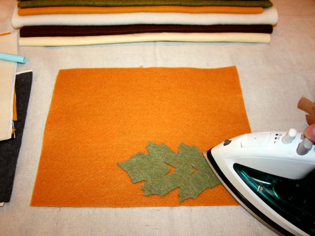 Ironing Green Felt Leaf to Orange Sheet