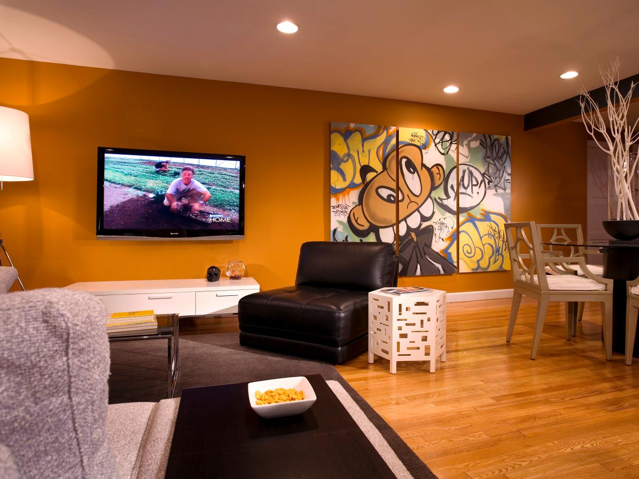 Modern Bachelor's Pad Living Room With Graffiti Art | HGTV