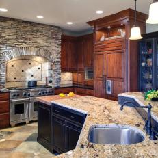 Traditional Kitchen with Rich Wood Cabinets and Stone Detail