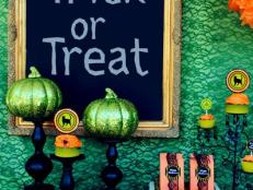 Halloween Treats Table With Green Pumpkins and Lace Accents