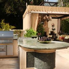 Traditional Outdoor Kitchen with Stylish Modern Island