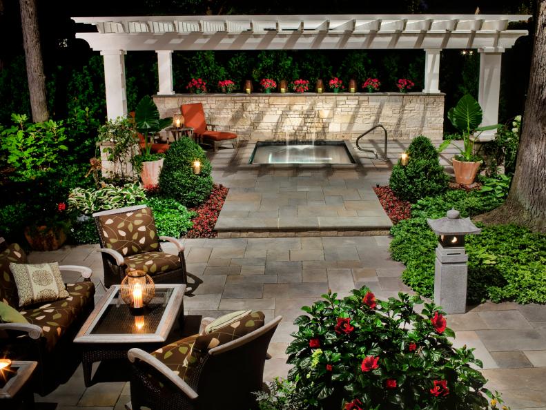 Traditional Outdoor Seating Area and Pergola Covered Spa
