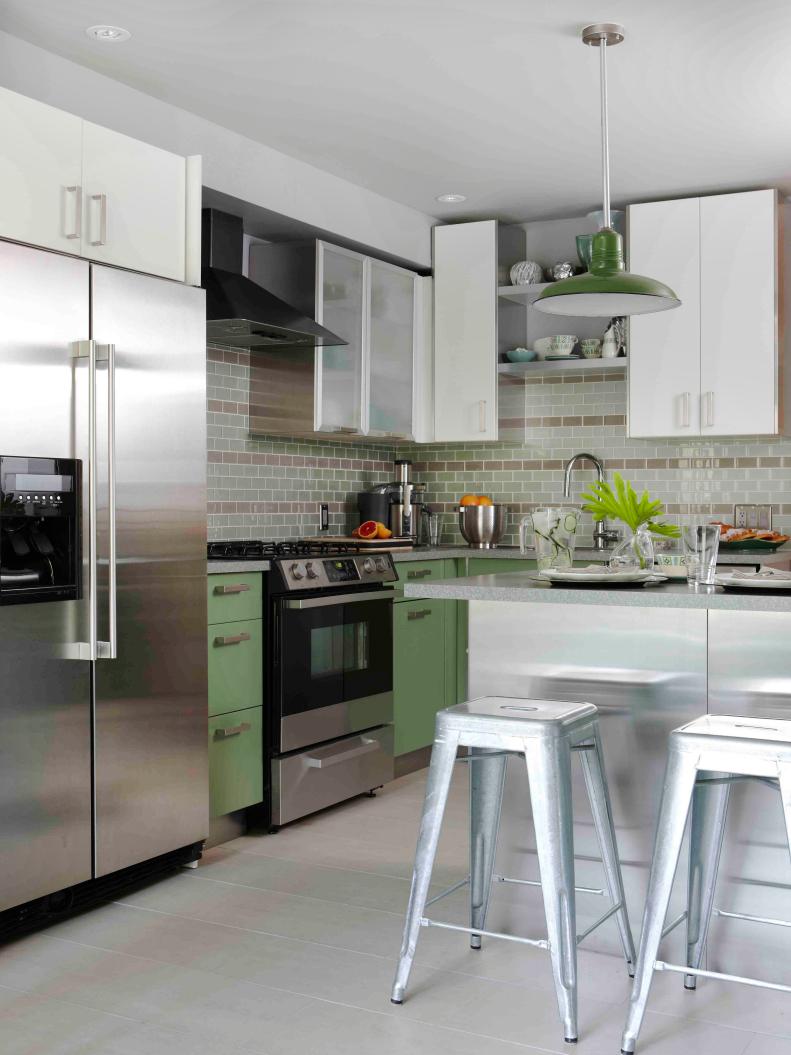 Kitchen With Green & White Cabinets, White Peninsula & Metal Barstools