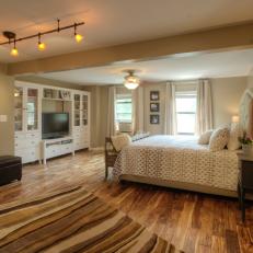 Neutral Transitional Bedroom With Hand-Scraped Wood Floors