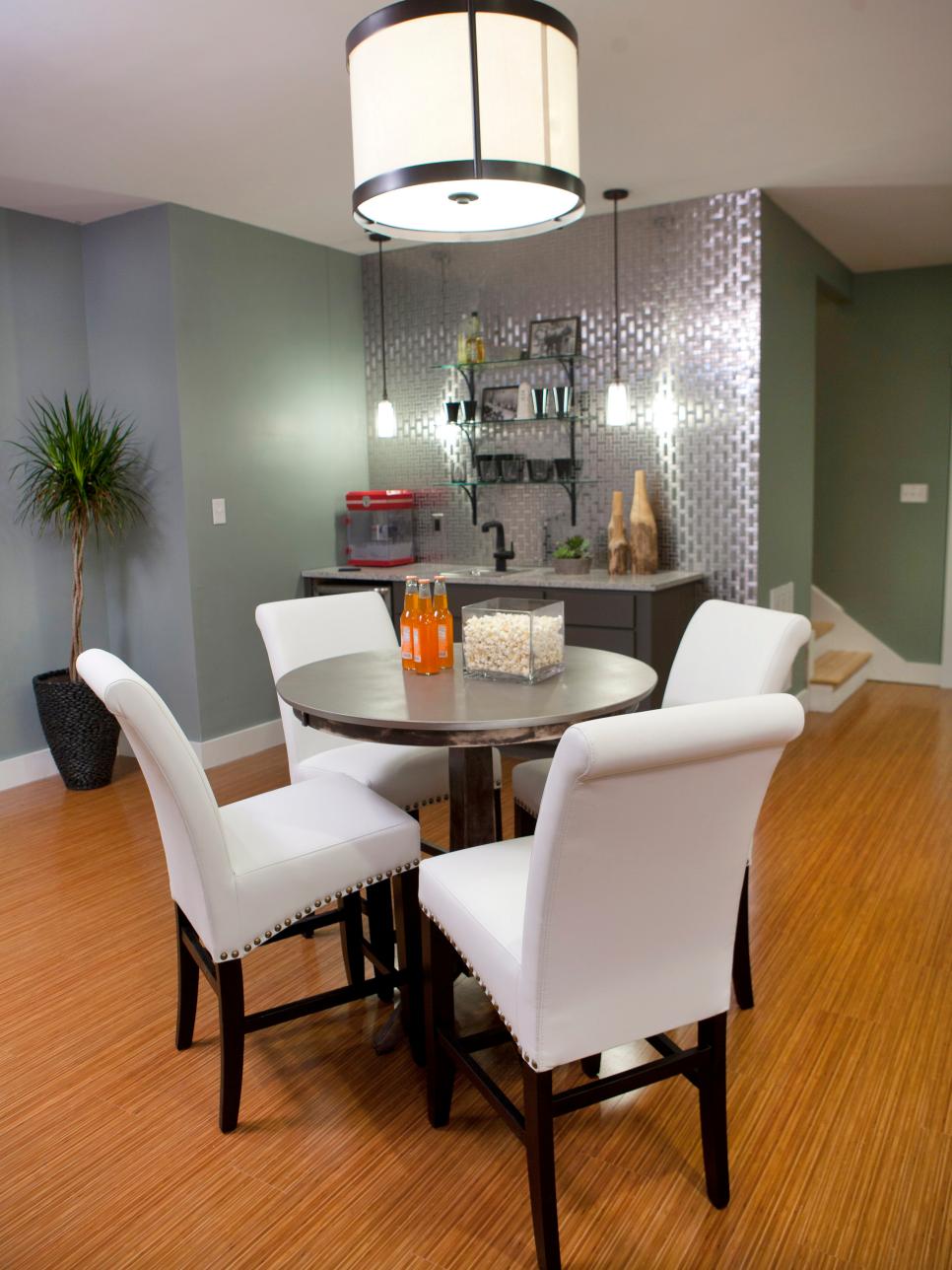 Sage Green Dining Room With Round Metal Table | HGTV