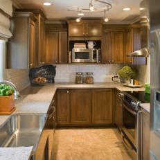 Transitional Galley Kitchen With Brown Cabinets