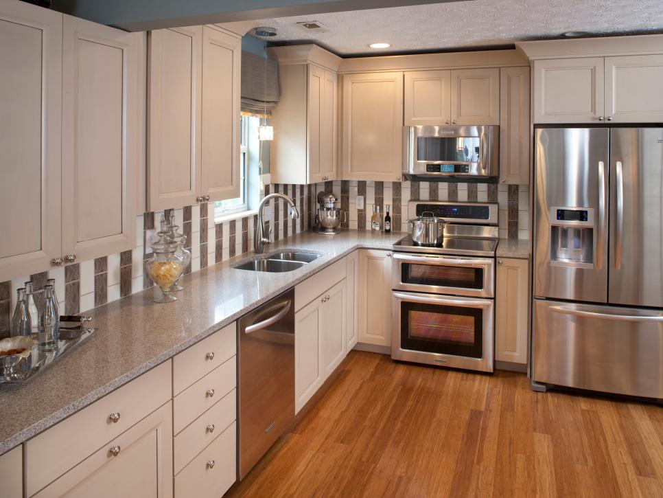 Cream Kitchen Cabinets With Black Stainless Steel Appliances
