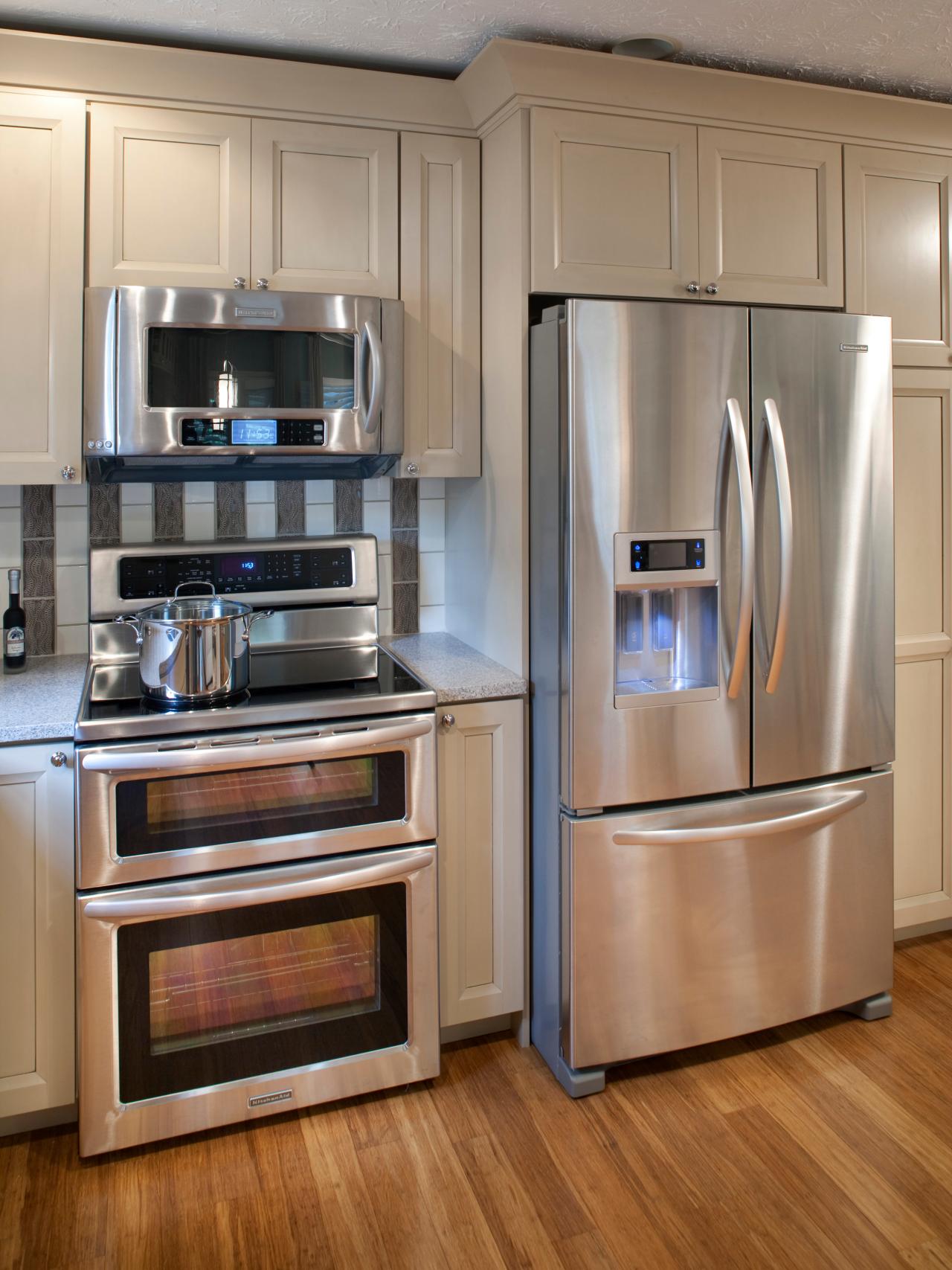 Neutral Kitchen Cabinets With Stainless Steel Refrigerator | HGTV