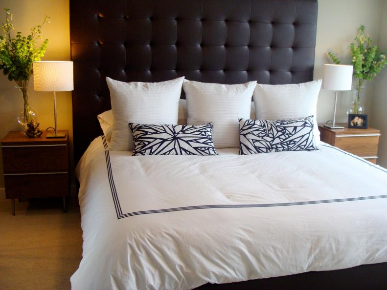 Contemporary Bedroom With Tufted Black Headboard