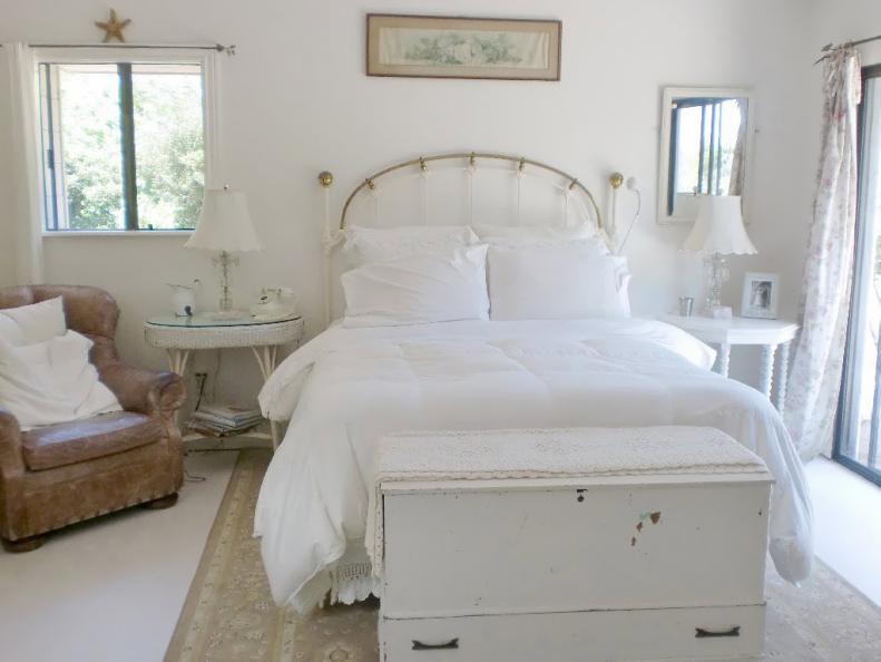 All White Bedroom With Iron Bed Frame