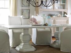 White Coastal Dining Room With White Farmhouse Table
