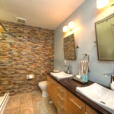 Stylish Gray Bathroom With Rustic Stone Accent Wall