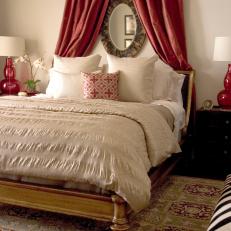 Neutral Bedroom With Bold Red Accents