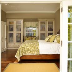 Cottage-Style Bedroom With French Doors