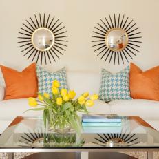 Tropical-Inspired Living Room With Sunburst Mirrors