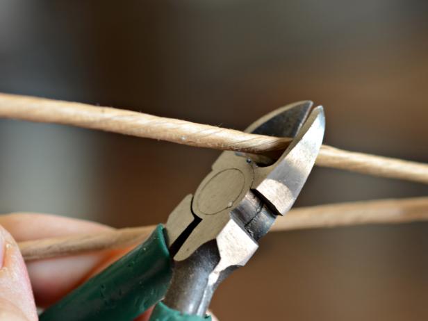 Use wire cutters to clip dried mushroom wire stems to approximately three inches long
