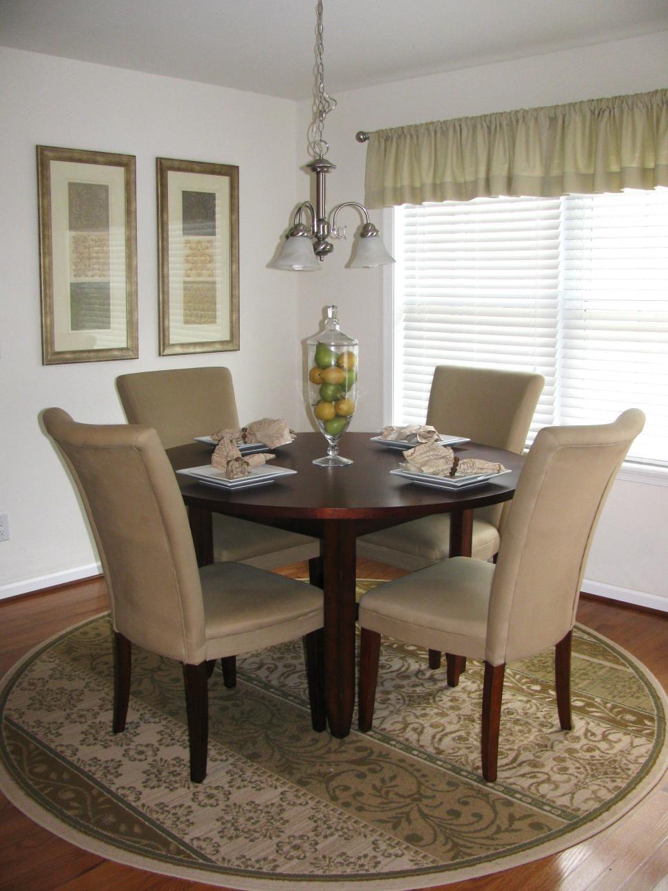 Neutral Transitional Dining Room With Round Table and Area ...