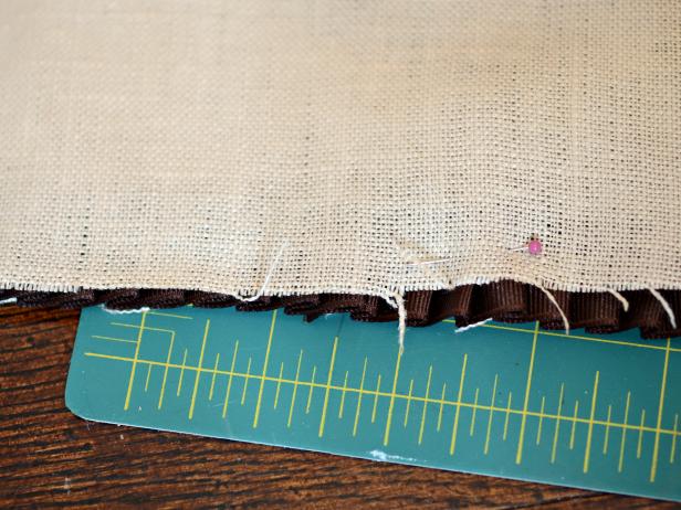 With acorn and trim facing up, place second piece of linen on top.