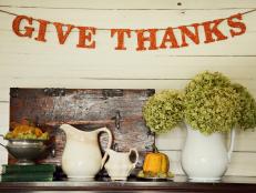 Thanksgiving vignette with banner that reads "give thanks"