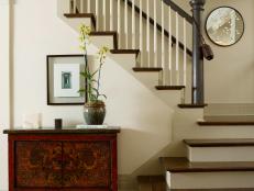 Transitional Foyer With Elegant Staircase