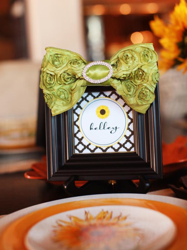 Make guests feel at home with customized printable place cards. Pop the cards into small frames embellished with ribbon to dress them up. Bonus: Guests can take the frames home and fill them with a photo of the day's festivities.