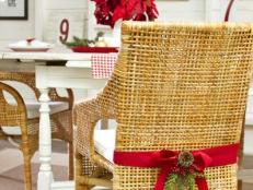 Wicker Dining Chair With Red Bow, Floral Sprig, Pine Cones and Berries