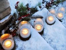 Candles Deliver Warmth to Snowy Steps
