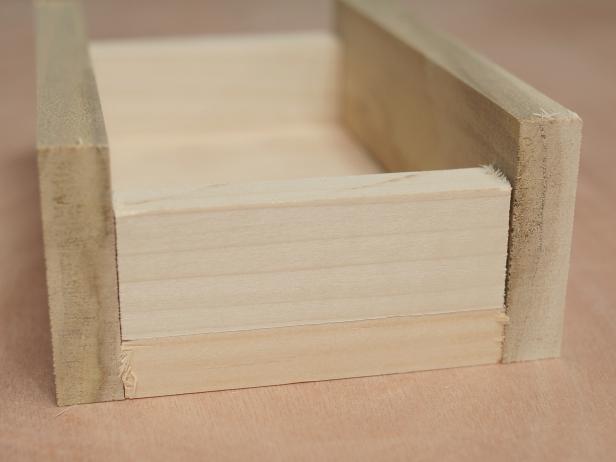 After wood pieces are cutting according to size, these poplar wood blocks are assembled to make a chalkboard stocking hanger.